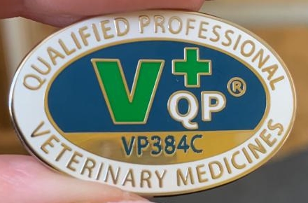 Vetpol SQP badge held in a hand